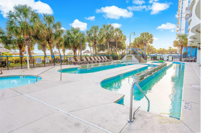 Beach resort community with shared pools and amenities