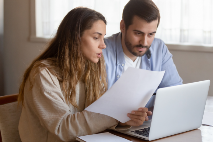 Family reviewing vacation rental policies before booking
