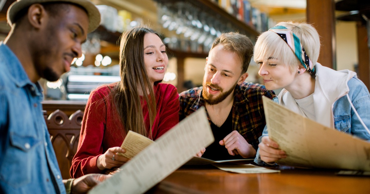 Family reviewing restaurant options while on vacation