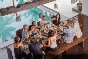 Large group staying together in a beach vacation rental