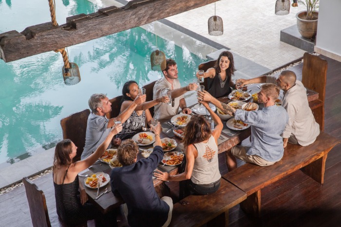Large group staying together in a beach vacation rental