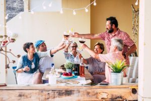 Kids and adults enjoying shared time in a vacation home