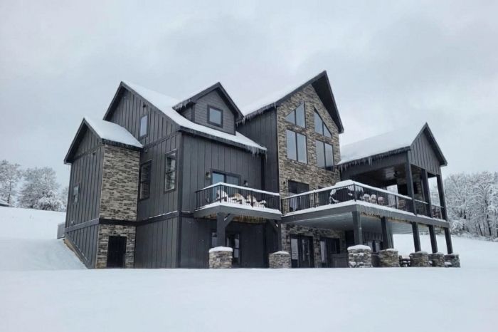 Cozy winter vacation rental with snow outside and warm indoor living space