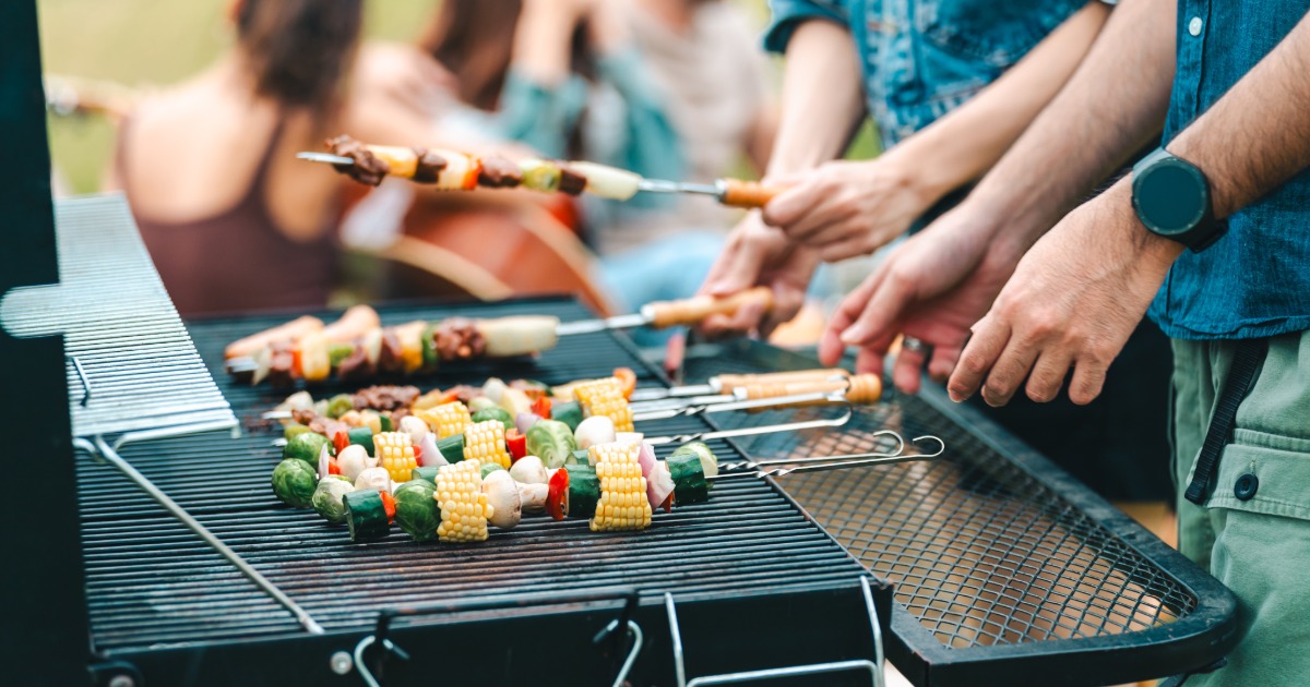 Family cooking dinner together in a vacation rental kitchen