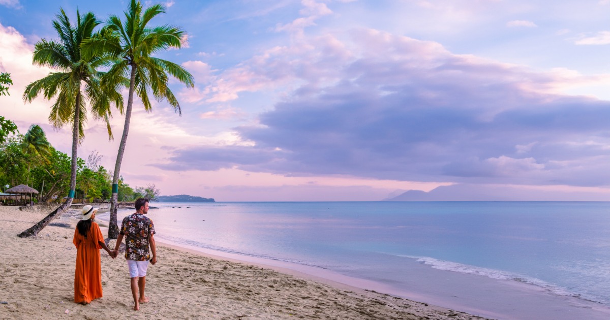 Couple enjoying ocean view from vacation rental balcony in Key Largo Florida