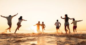 Large family reunion group gathering on the beach in Myrtle Beach