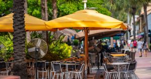 bp-wteobx-patio-unbrellas | Swack Vacations Casual beachside restaurant patio in the Outer Banks North Carolina