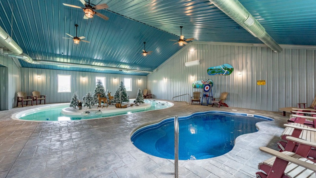 Deep Creek Lake luxury home with indoor lazy river, pool, and theater room