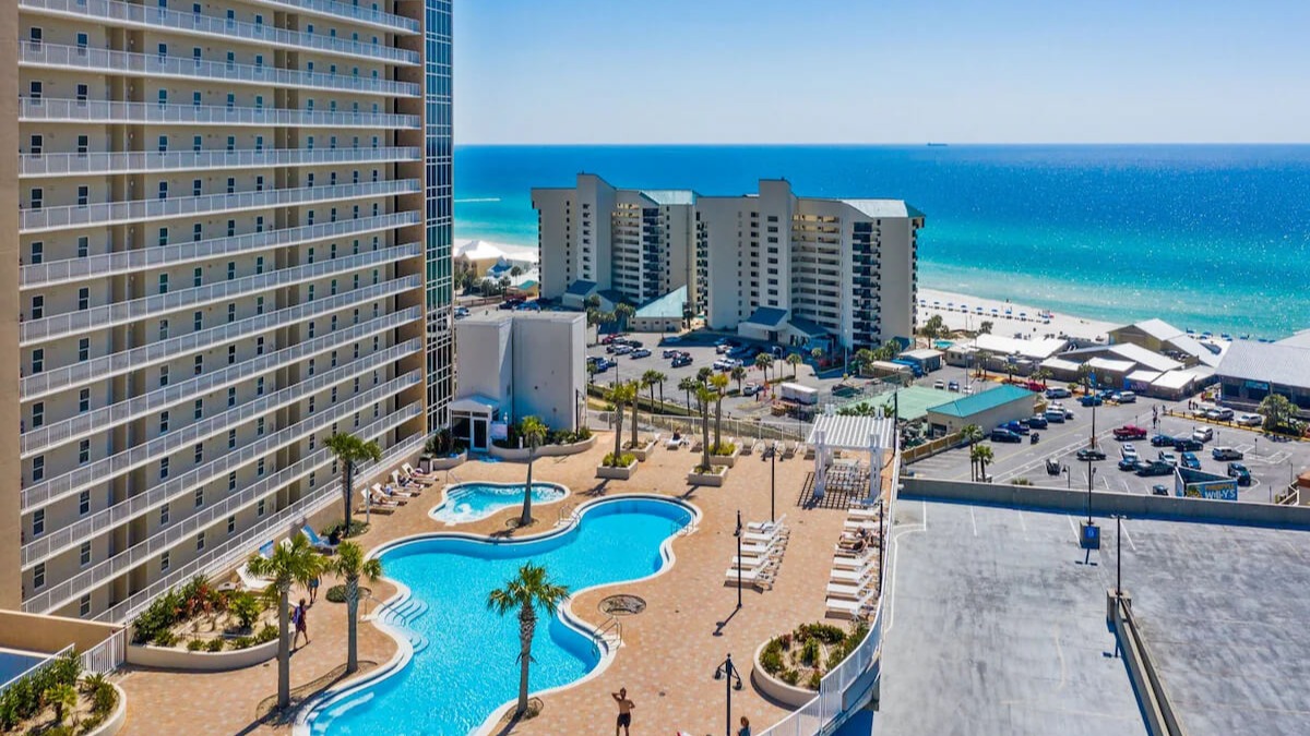 Panama City Beach resort condo with large balcony, lake views, and beach access