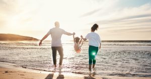 Couple confidently booking a vacation rental online after reviewing details