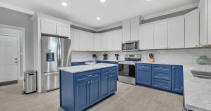 Spacious vacation rental kitchen with large dining table, full appliances, and room for a big family group