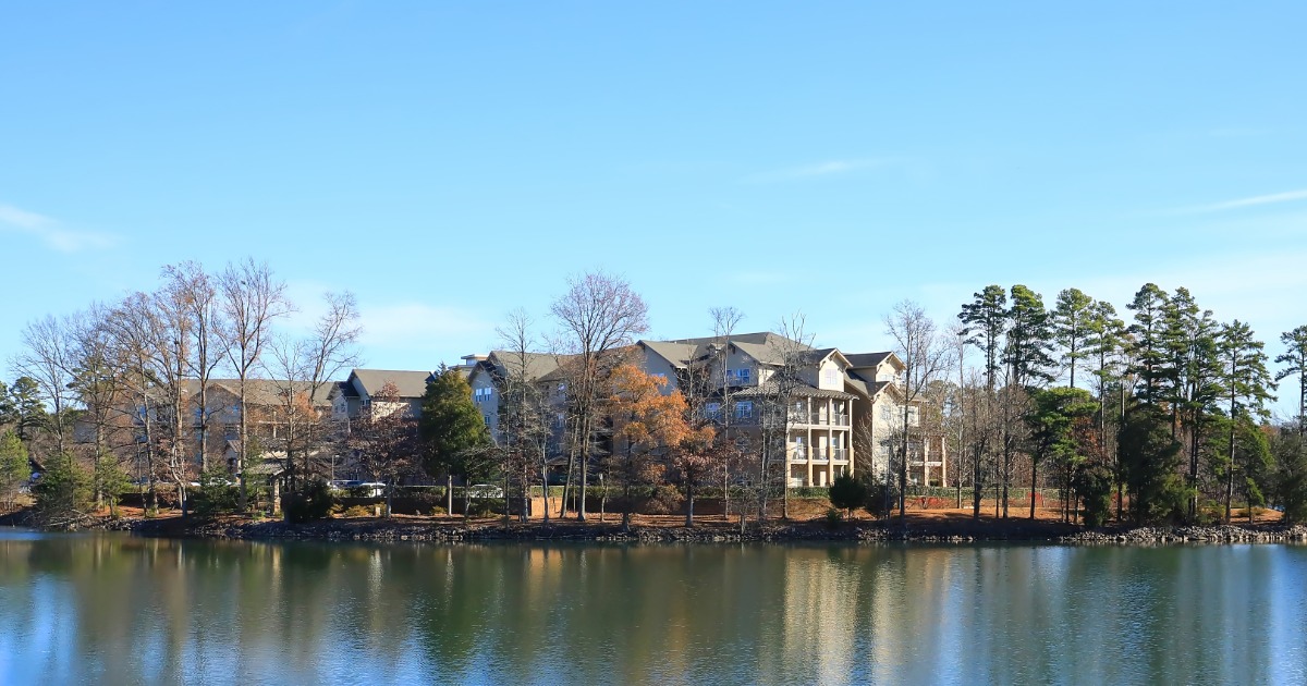 View of Lake Norman NC shoreline with homes and docks along calm blue water