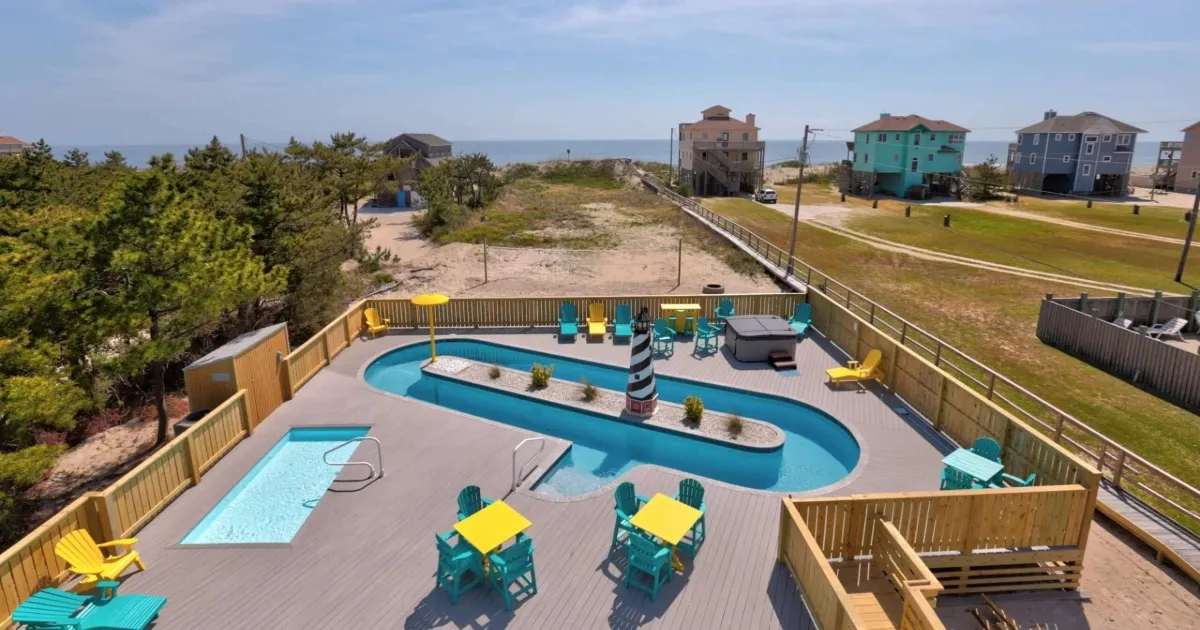 Private lazy river winding through the deck area of an oceanfront vacation home