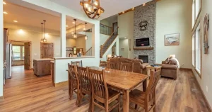 how-early-body1 | Swack Vacations Spacious open-concept living and dining area in a large group vacation rental